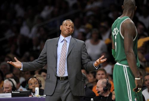 Boston Celtics coach Doc Rivers talks with Kevin Garnett during play against the Los Angeles Lakers in the second half of Game 5 of the NBA basketball finals Sunday in Los Angeles. Kevork Djansezian, The Associated Press
