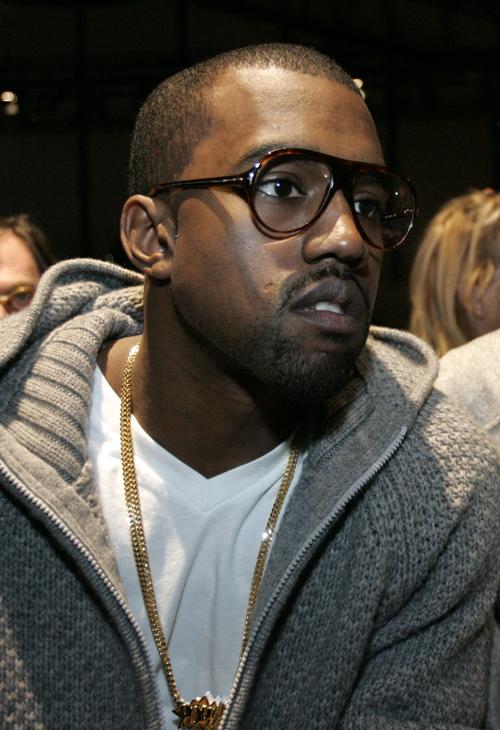 Kanye West attends a fashion show in Paris, on Feb. 28. In a rant on his blog written Tuesday, West defended himself from criticism over his delayed performance at the Bonnaroo Music & Arts Festival. Thibault Camus, The Associated Press
