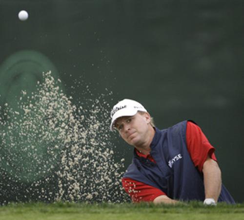 Steve Stricker hits out of a bunker on the 12th green during the first round of the US Open championship at Torrey Pines Golf Course on Thursday in San Diego. Matt Slocum, The Associated Press
