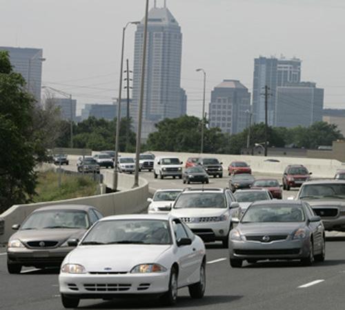 Motorists leave the city of Indianapolis at rush hour on July 7. Traffic deaths in many states this year are on track to post their biggest percentage decline since the Arab oil embargo in the 1970s as motorists reduce their driving amid record-setting ga Darron Cummings, The Associated Press
