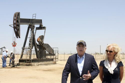 Republican presidential candidate, Sen. John McCain, R-Ariz., accompanied by his wife Cindy, speaks to reporters during a tour of the Red Ribbon Ranch Oil Lease on Monday in Bakersfield, Calif. The Associated Press
