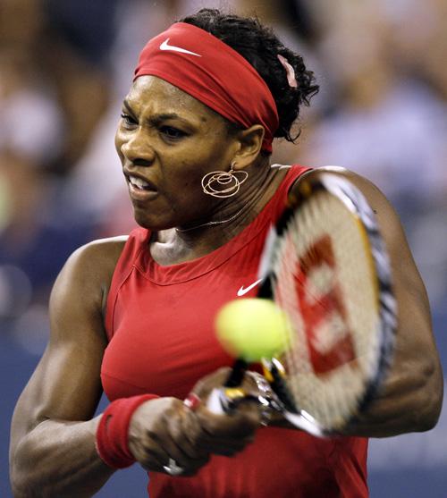 Serena Williams, of the United States, returns to Elena Vesnina, of Russia, at the U.S. Open tennis tournament in New York Thursday, Aug. 28, 2008. Elise Amendola, The Associated Press
