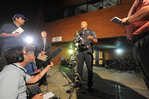 Aurora, Colo., police Detective Marcus Dudley speaks to the media during a press conference at the Aurora Police Department in Aurora on Monday. Bill Ross, The Associated Press
