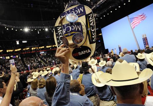 The Texas delegation applauds first lady Laura Bush during the opening of the Republican National Convention in St. Paul, Minn. on Monday. Susan Walsh, The Associated Press
