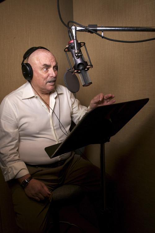 In this Feb. 14, 2007 file photo Don LaFontaine, a voice over actor, records a commercial in his recording studio at his Silver Lake home in Los Angeles. LaFontaine, the voice behind thousands of Hollywood movie trailers, died Monday, Sept. 1, 2008 at age Damian Dovarganes, The Associated Press
