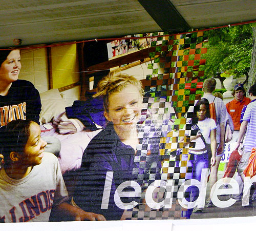 Murals decorate the walls of two gyms in the ARC on Peabody Drive in Champaign. The murals depict images of students and campus life. Erica Magda
