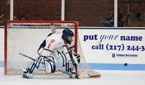 Goalie Mike Burda watches for the puck in a match against Oakland University at the Ice Arena on Oct. 3. The Illini hope to combine goaltending and offensive skills to defeat Ohio State on Friday and Saturday. Erica Magda
