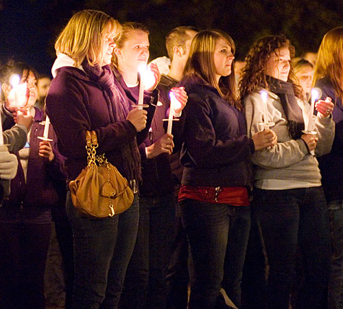 Members of Alpha Delta Pi gather outside the Illini Union Wednesday to hold a public candlelight vigil for Katie McGuire, a university junior who died in a car accident Monday night. Erica Magda
