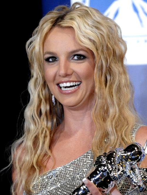 In this Sept. 7, 2008, file photo, Britney Spears poses with her awards backstage at the 2008 MTV Video Music Awards in Los Angeles. Chris Pizzello, The Associated Press
