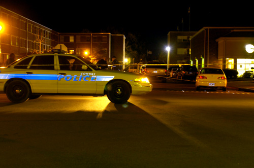 Conway and University of Central Arkansas police officers investigate the scene of a shooting on the campus of University of Central Arkansas in Conway, Ark. late Sunday. Two were killed in the shooting and one was wounded. Joe Lamb, The Associated Press
