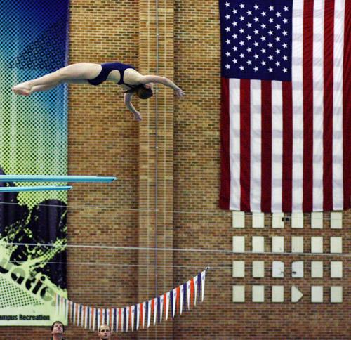 Illini diver Bridget Keeley dives in the meet against Michigan State on Friday, Oct. 17. Erica Magda

