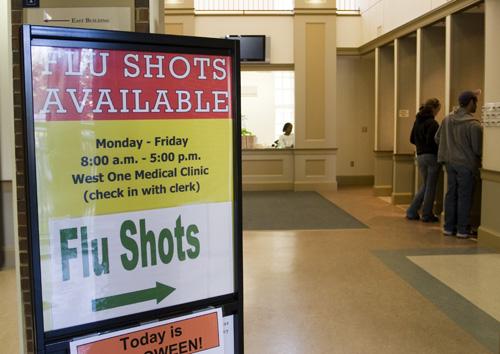 A sign in the lobby of Mckinley points students to where they can recieve their flu shots. Erica Magda
