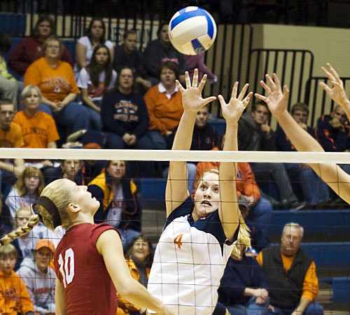 Abby Nelson and Kylie McCulley go up for a block at the home game against Indiana on Nov. 15 in Huff Hall. Erica Magda
