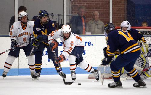 Senior Jason Nemeth looks to center the puck against Michigan-Dearborn at the Ice Arena last Friday. The Illini prepare to play Lindenwood this weekend. Erica Magda
