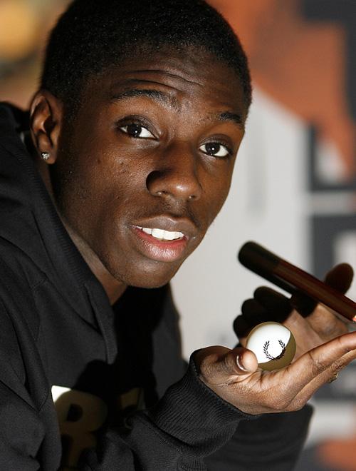 British table tennis star Darius Knight poses during an interview in London, England, Wednesday. Knight, 18-years-old and currently ranked No. 2, is expecting to represent Britain in the 2012 London Olympics. Simon Dawson, The Associated Press
