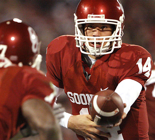 Oklahoma quarterback Sam Bradford, right, hands the ball off to DeMarco Murray during a football game against Texas Tech in Norman, Okla. on Saturday, Nov. 22. Oklahoma will be heading to the Big 12 finals. Alonzo Adams, The Associated Press
