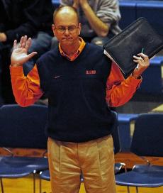 Illinois volleyball head coach Don Hardin signals to players during the match against Michigan State, Oct. 28, 2006 at Huff Hall. Illinois lost to Michigan State in three games, 30-26, 30-16, 30-22. Hardin announced his retirement Monday. Erica Magda
