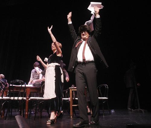 Actor Tom Hanks, right, waves to the audience along with his wife, actress Rita Wilson during the curtain call of "One Night Only...With a Little Help From Our Friends" benefiting UCLA School of Theater, Film and Television at Royce Hall in London. Dan Steinberg, The Associated Press
