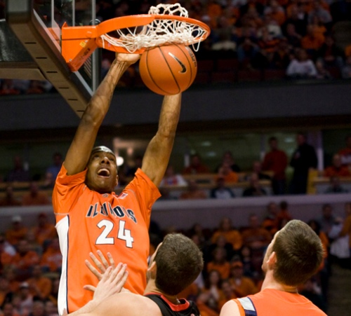 Mike Davis executes an alley-oop at the basketball game held at the United Center in Chicago against Georgia on Saturday Dec. 6 2008. Davis scored 14 points in the game helping the Illini defeat Georgia 76-42. Erica Magda
