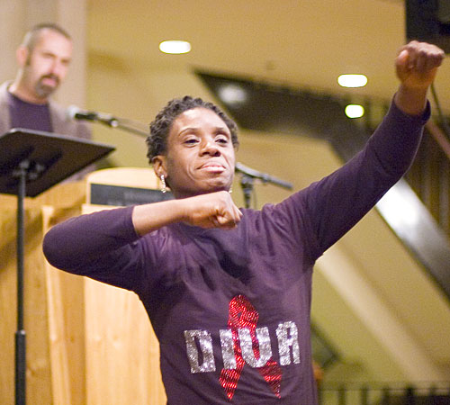 Juanita Hunter, who has been HIV positive for 12 years, performs an interpretive dance at the World AIDS Day event at the Krannert Center for Performing Arts Monday. Monday was the 20th anniversary of the first World AIDS Day. Erica Magda
