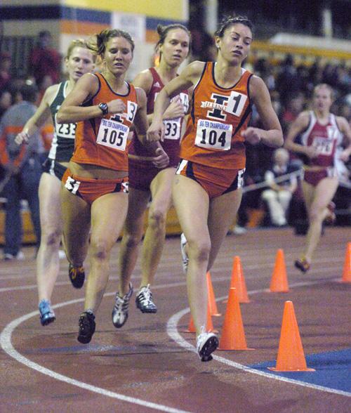 Patrick Traylor The Daily Illini Angela Bizzari leads her heat, followed by fellow Illini Theresa Brokaw, in the preliminary one mile run competition during the Big Ten Womens Indoor Track and Field Championships at the U of I Armory on Saturday, February 24, 2007. Bizzari finished in third place overall in the event with an NCAA provisional qualifying time of 4:46.02.

