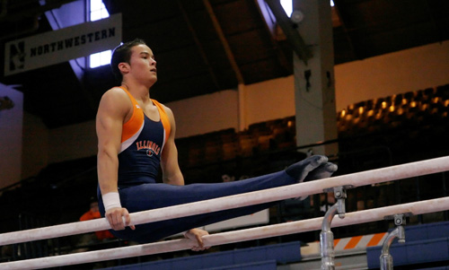 Adam Babcock The Daily Illini Illinois Paul Ruggeri performs on the parallel bars during the gymnastics meet at Huff Hall in Champaign, Ill, Saturday, March 8, 2008..
