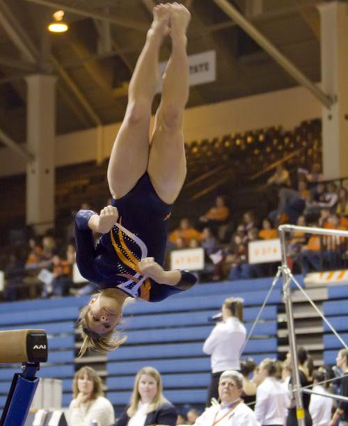Trevor Greene The Daily Illini Illinois Hannah Welker performs an exhibition on the balance beam during the meet against Iowa in Huff Hall on Saturday, January 24th. The Illini fell to the Hawkeyes 194.400 to 194.950.
