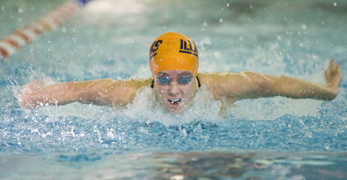 Senior Ali Keehn of the Illini swimming team races down the pool in the 100-yard butterfly race on Oct. 10, 2008. Keehn won the 100-yard butterfly with a time of 56.85 seconds and has been one of the leading swimmers for the Illini this season. Erica Magda
