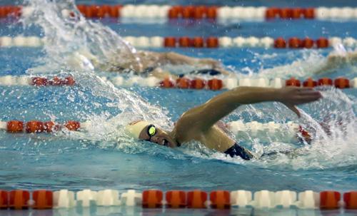 Trevor Greene The Daily Illini Illinois Brittany McGowan competes in the 100 yard freestyle during the meet in the ARC pool against Illinois State University on Saturday, January 24th. Illinois beat Illinois state 219 to 81.
