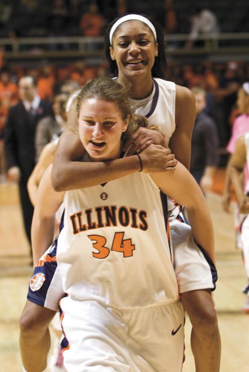 Ned Mulka The Daily Illini Lana Rukavina, 34, carries Lacey Simpson, 22, after the Illini defeated the Indiana Hoosiers 61-52 at Assembly Hall on Sunday, January 25th, 2008. The win was the Illinis first against a Big Ten opponent this season.
