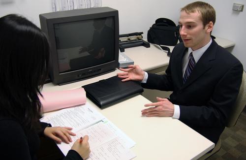 Sujie Zhou (left), a graduate student, interviews Andrew Wood (right), a senior in LAS, during a mock interview at the Career Center on Wright Street on Friday afternoon. Wood found the experience very helpful and said, The more times you do it the more Pamela Nisivaco
