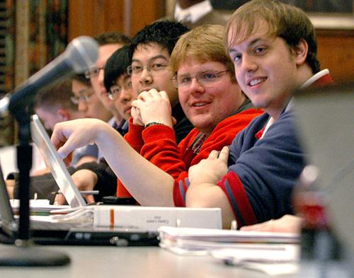 Members of the Illinois Student Senate direct their attention to a screen displaying the meeting agenda on Wednesday at the Pine Lounge in the Illini Union. ISS is attempting to prioritize its goals of spending and influence, among other things, in time for spring elections. Donald Eggert
