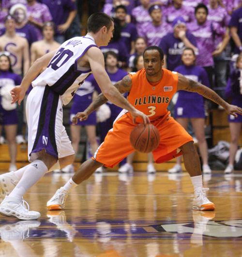 Trevor Greene The Daily Illini Illinois Chester Frazier plays defense during the game against Northwestern on Thursday, Feb. 12. Illinois won the game 60-59 with a last second shot.
