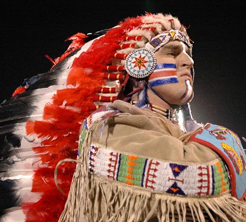 Chief Illiniwek leaves the field after performing during the halftime show of the Illinois-Ohio football game at Memorial Stadium on Oct. 14, 2006. 
