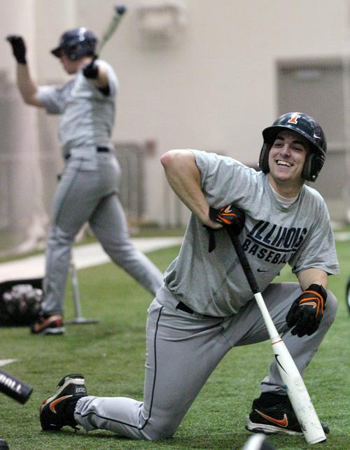 Brandon Wikoff, a junior infielder, prepares to take batting practice in the Irwin Indoor Practice Facility in Champaign on Wednesday. The Illini head to Florida for the season opener against Iowa on Friday. Erica Magda
