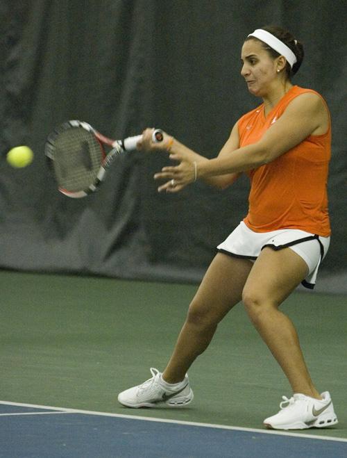 Ned Mulka The Daily Illini Illinois Marisa Lambropoulos returns the ball during doubles play against Kansas University at the Atkins Tennis Center on Friday, February 6th, 2009.The Illini swept the Jayhawks 7-0 in singles play.
