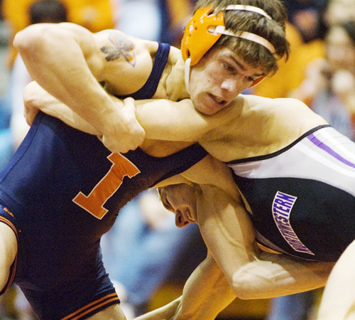 Wrestling takes care of business at home
