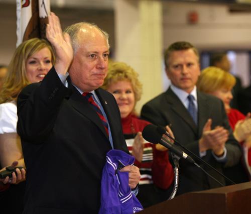 Illinois Gov. Pat Quinn waves to the crowd at an assembly at Collinsville High School on Friday to honor several people who saved a life in December. Tim Vizer, The Associated Press
