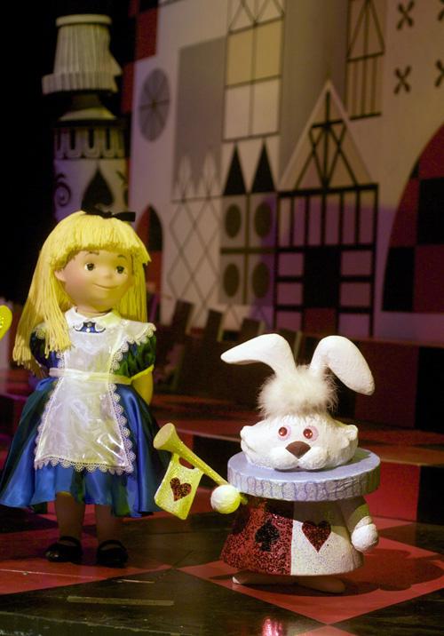 ** EMBARGOED ONLINE AND TV UNTIL 3:01 AM EDT THURSDAY, FEB. 5, 2009 ** The characters Alice and the White Rabbit from Alice in Wonderland have been added to the Its A Small World ride seen at Disneyland in Anaheim, Calif. on Friday, Jan. 23, 2009. (AP Photo/Damian Dovarganes)
