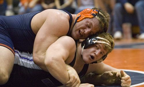 Ned Mulka The Daily Illini Illinois John Wise wrestles opponent Paul Rands during the match between No. 9 Illinois and No. 17 Northwestern at Huff Hall on Friday, February 6th, 2009. Wise won in a technical fall 15-0 and the Illini triumphed 22-13 over the Wildcats.
