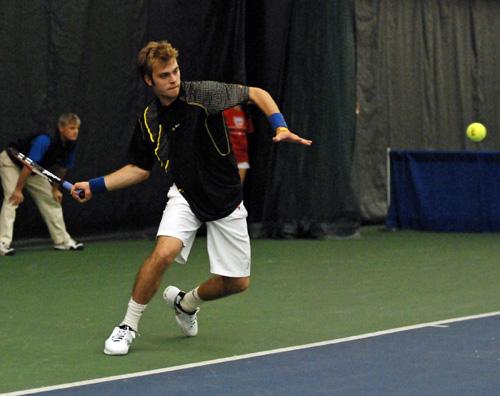 Illinois Dennis Nevolo prepares to hit the ball Tuesday against Illinois Alumni Kevin Anderson. Nevolo lost to anderson in two sets.
