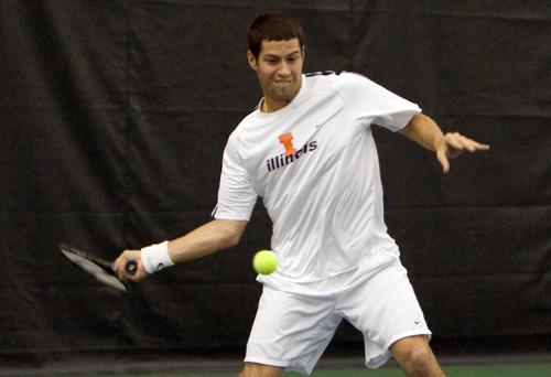 Senior Marc Spicijaric volleys the ball back to his Ohio State opponents in a doubles match at Atkins Tennis Center on April 12. After two weeks of rest, the Illini will take on No. 36 Duke and No. 8 Tennessee this weekend. Erica Magda
