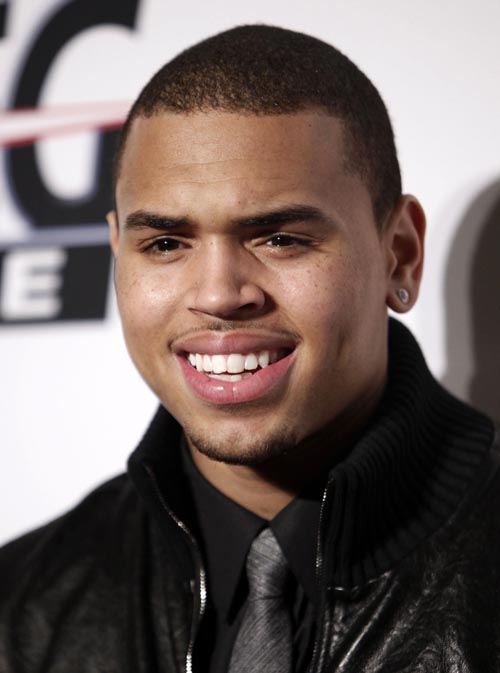 In this Feb. 7, 2009 file photo, Chris Brown arrives at the Clive Davis pre-Grammy party in Beverly Hills, Calif. Matt Sayles, The Associated Press
