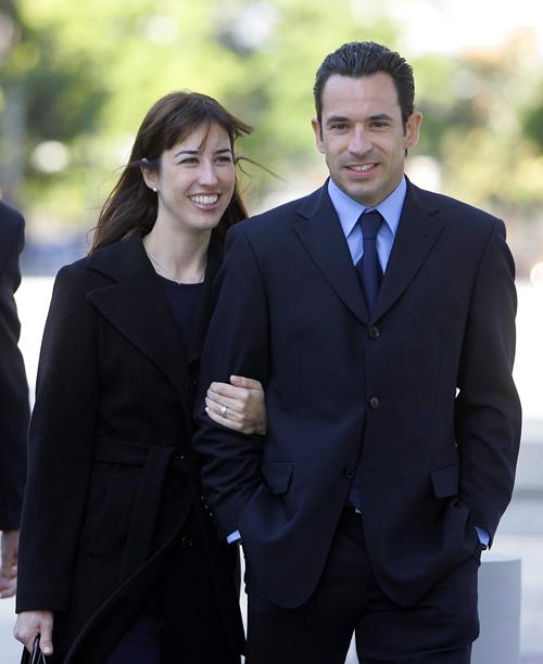 Brazilian race driver Helio Castroneves, right, accompanied by his sister, Katiucia Castroneves, arrive at federal court in Miami, Monday, March 2, 2009. Alan Diaz, The Associated Press
