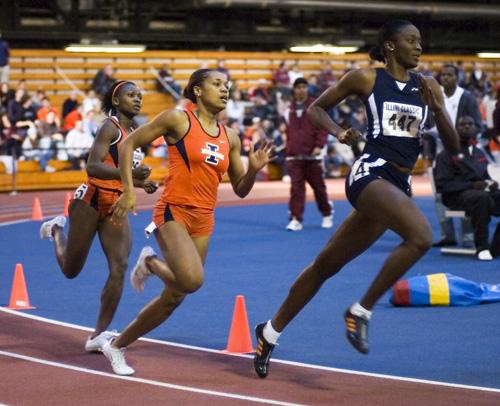 Ned Mulka The Daily Illini Illinois Deserea Brown and Omoye Ugiagbe compete in the Womens 400 meter during the Carle/Health Alliance Invite at The Armory on Jan. 24, 2008.
