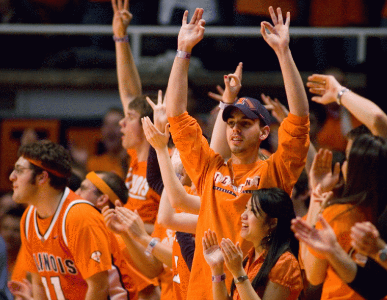 Fans celebrate a three-pointer made by the Illini during the game against Penn State at Assembly Hall, February 18, 2009. The team will play in Portland, Ore., but not many students will make the trip.
