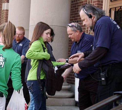 Security guards check students bags Friday morning as they enter Foellinger Hall on March 6, 2009. Aaron Facemire
