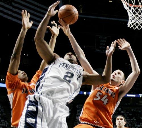 Penn State forward Jamelle Cornley (2) tries to put the ball up between Illinois forward Mike Davis, left, and center Mike Tisdale, right, during the first half of an NCAA college basketball game in State College, Pa., Thursday, March 5, 2009. (AP Photo/Carolyn Kaster)
