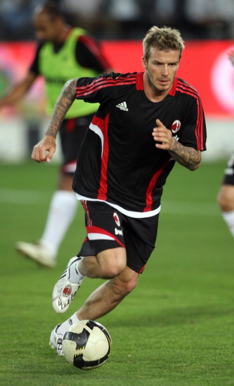 British soccer player David Beckham plays in a practice session for AC Milan at the Al Saad stadium in Doha, Qatar, on Tuesday. No deal has been finalized to keep Beckham in Milan after his two-month loan is up. Udayan Nag, The Associated Press
