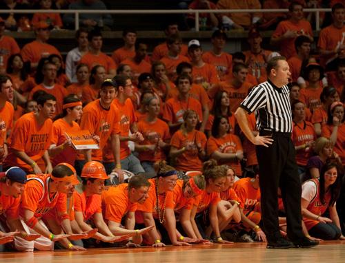 Members of Orange Krush attempt to distract a Purdue free-throw shooter on Feb. 8 at Assembly Hall. Dean Santarinala
